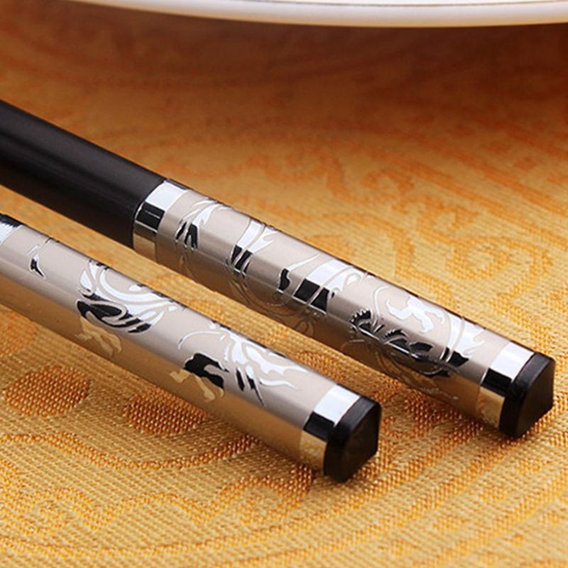 Détail du manche de la baguette chinoise Dragon d’Argent